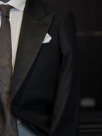 Dark black satin-paneled blazer