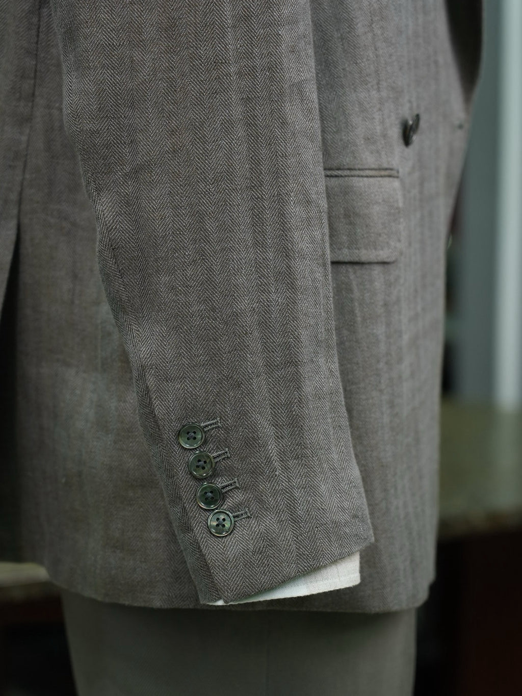 Grey-green linen herringbone double-breasted single-breasted suit